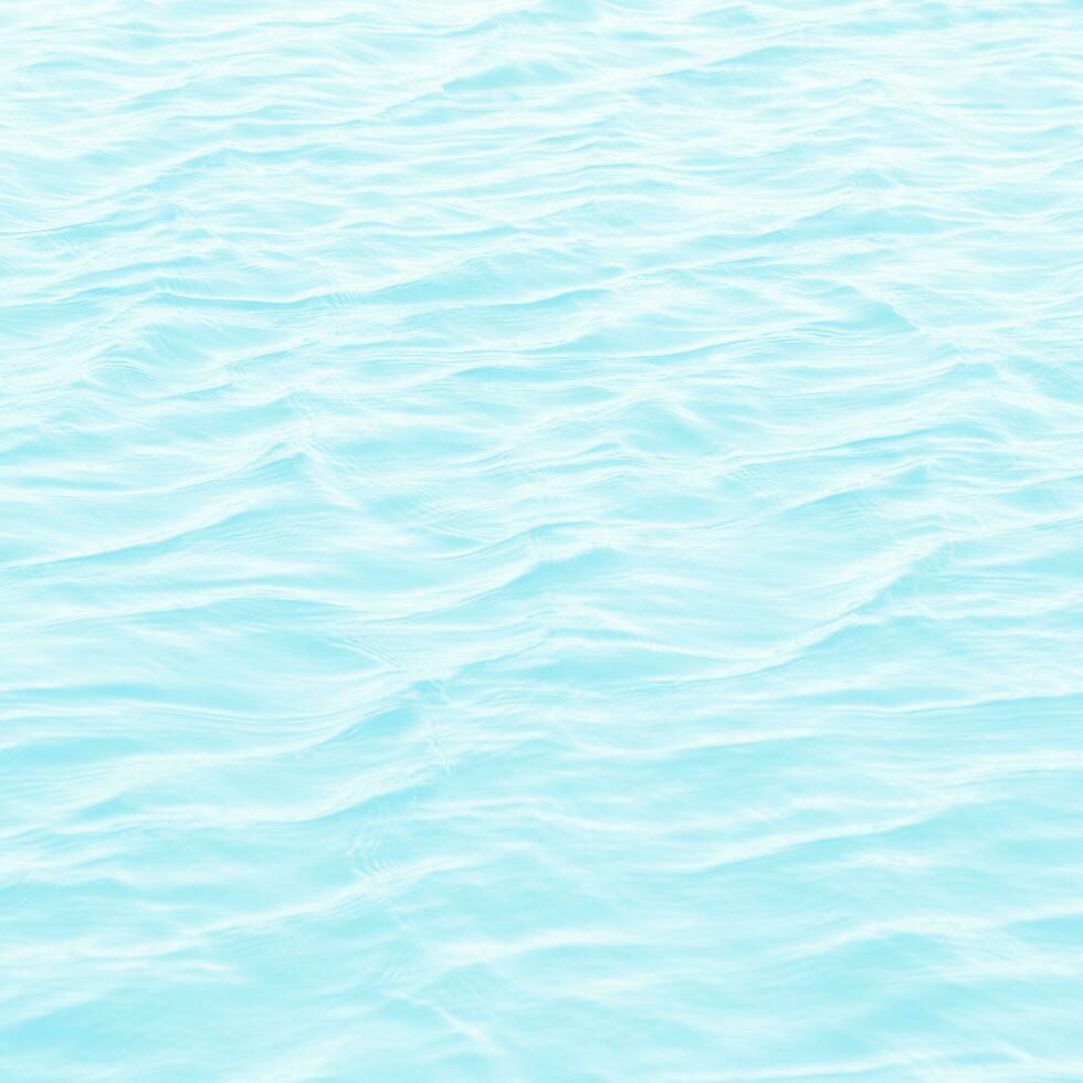 abstract blauw zwemmen zwembad water achtergrond en zon licht foto