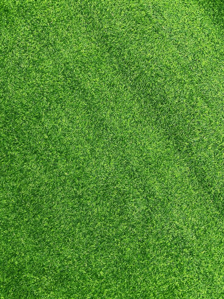 groen gras textuur achtergrond gras tuin concept gebruikt voor het maken van groene achtergrond voetbalveld, gras golf, groen gazon patroon gestructureerde achtergrond. foto