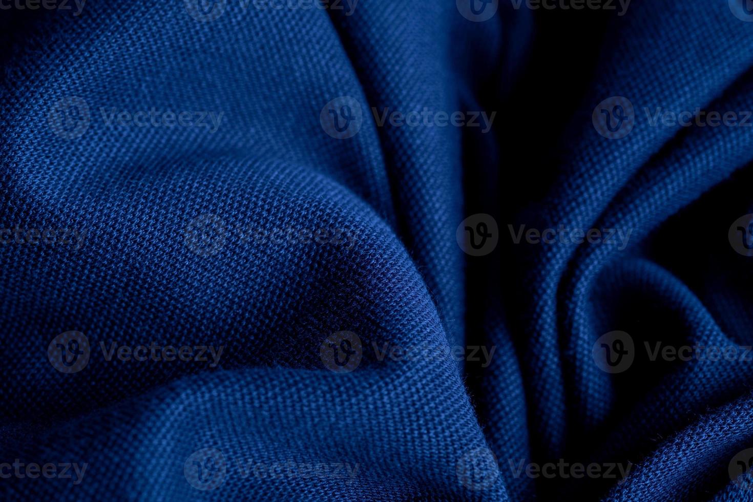 blauwe stof textuur achtergrond, abstract, close-up textuur van doek foto