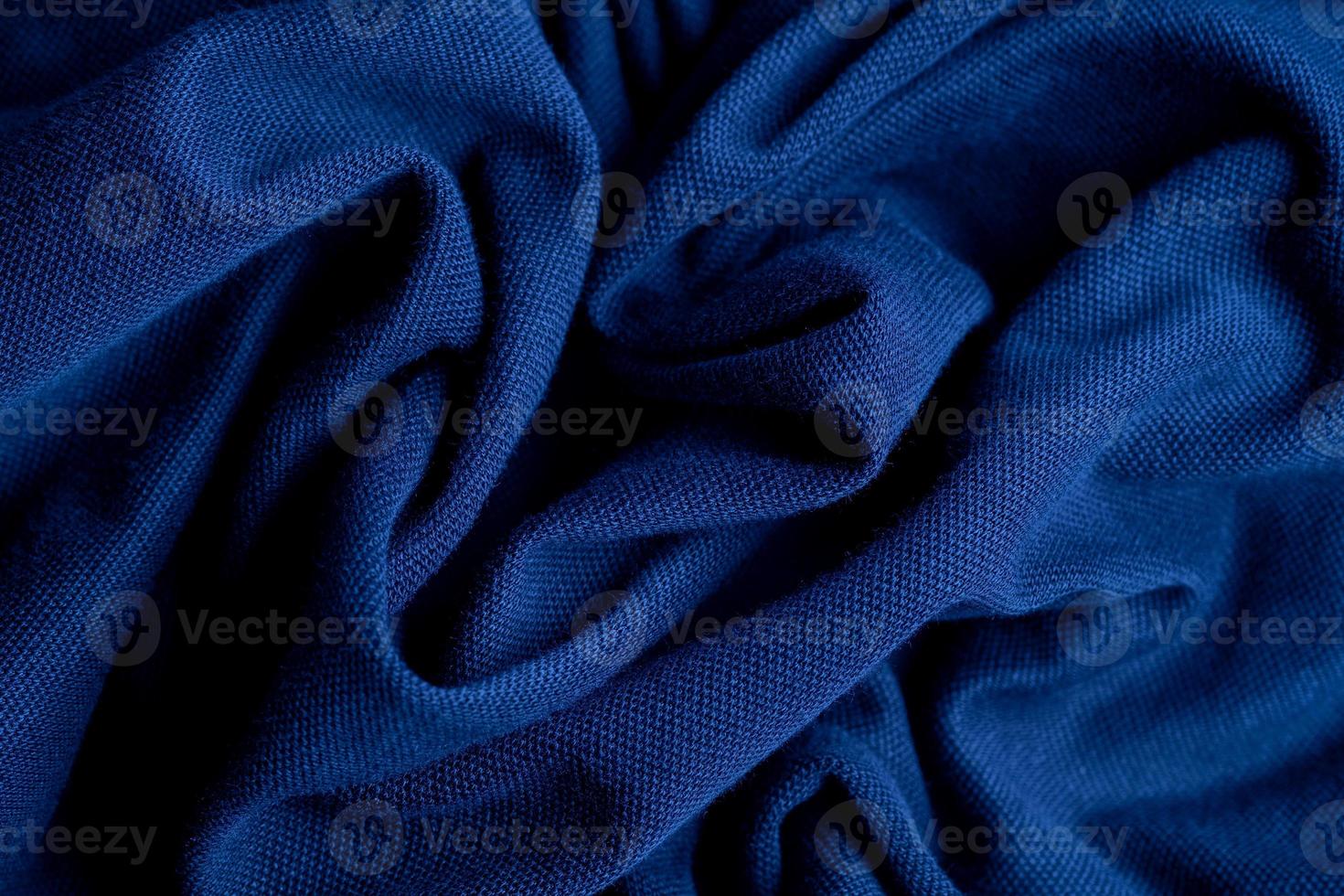 blauwe stof textuur achtergrond, abstract, close-up textuur van doek foto