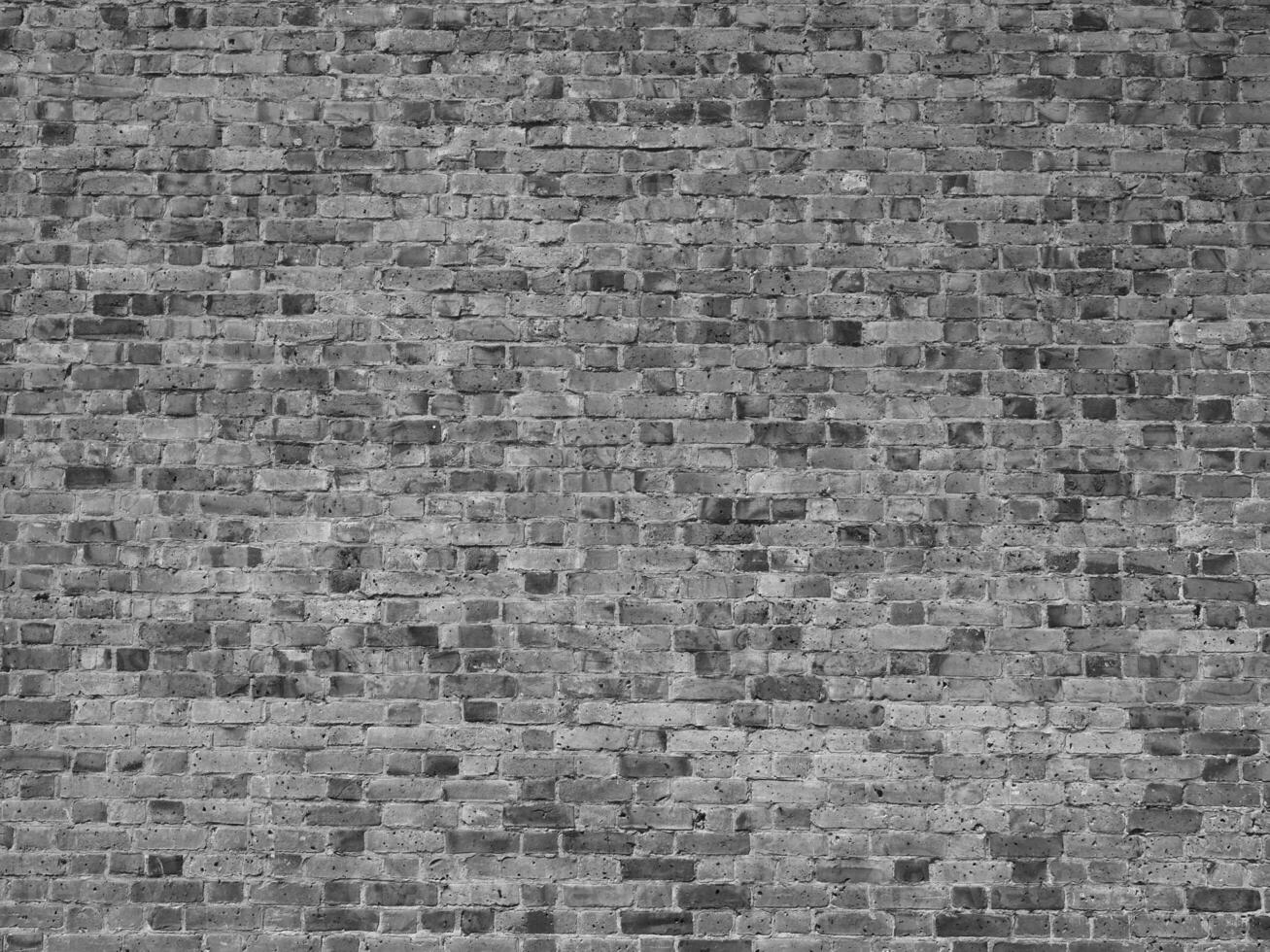 zwart en wit steen muur achtergrond foto