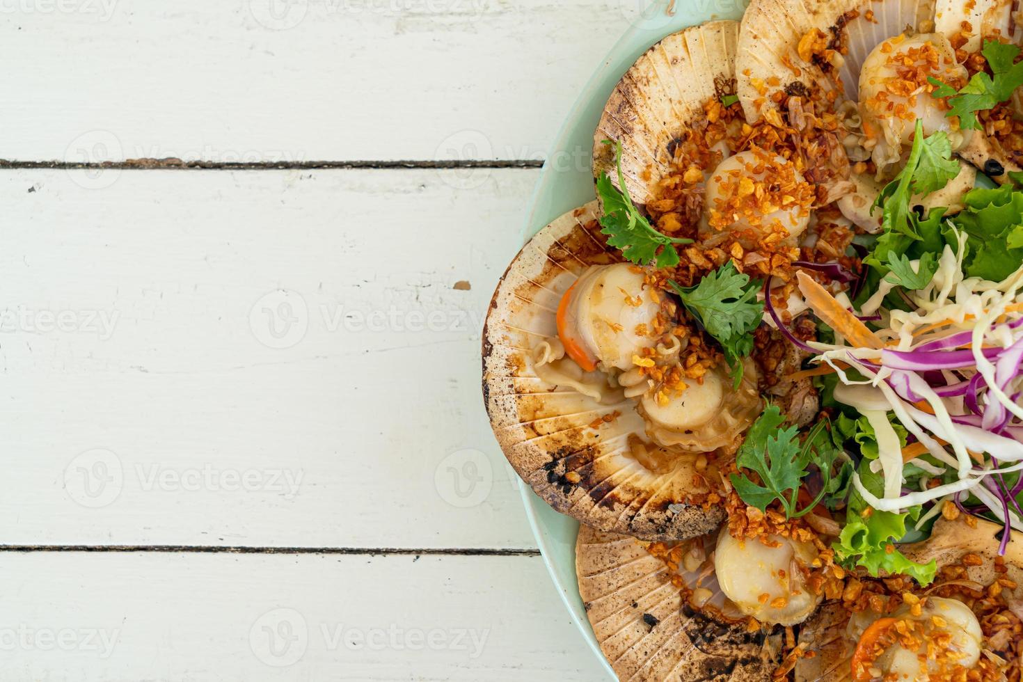 boter en knoflook gegrilde coquilles foto