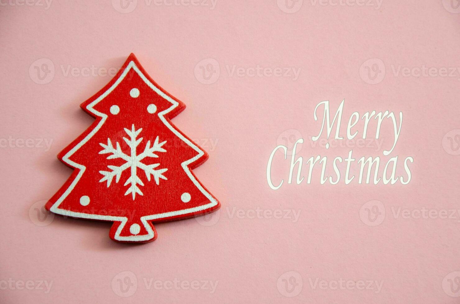 vrolijk kerstmis. vrolijk Kerstmis kaart. perzik Kerstmis achtergrond. koraal kleur met de opschrift vrolijk kerstmis. nieuw jaar. foto
