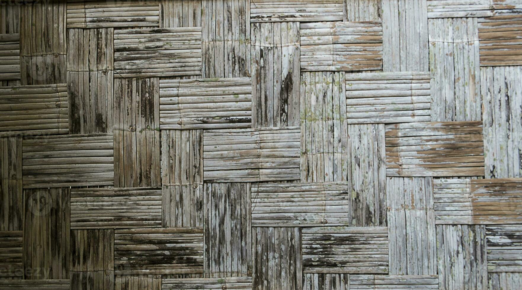 de muur gemaakt van bamboe abstracte achtergrondtextuur foto