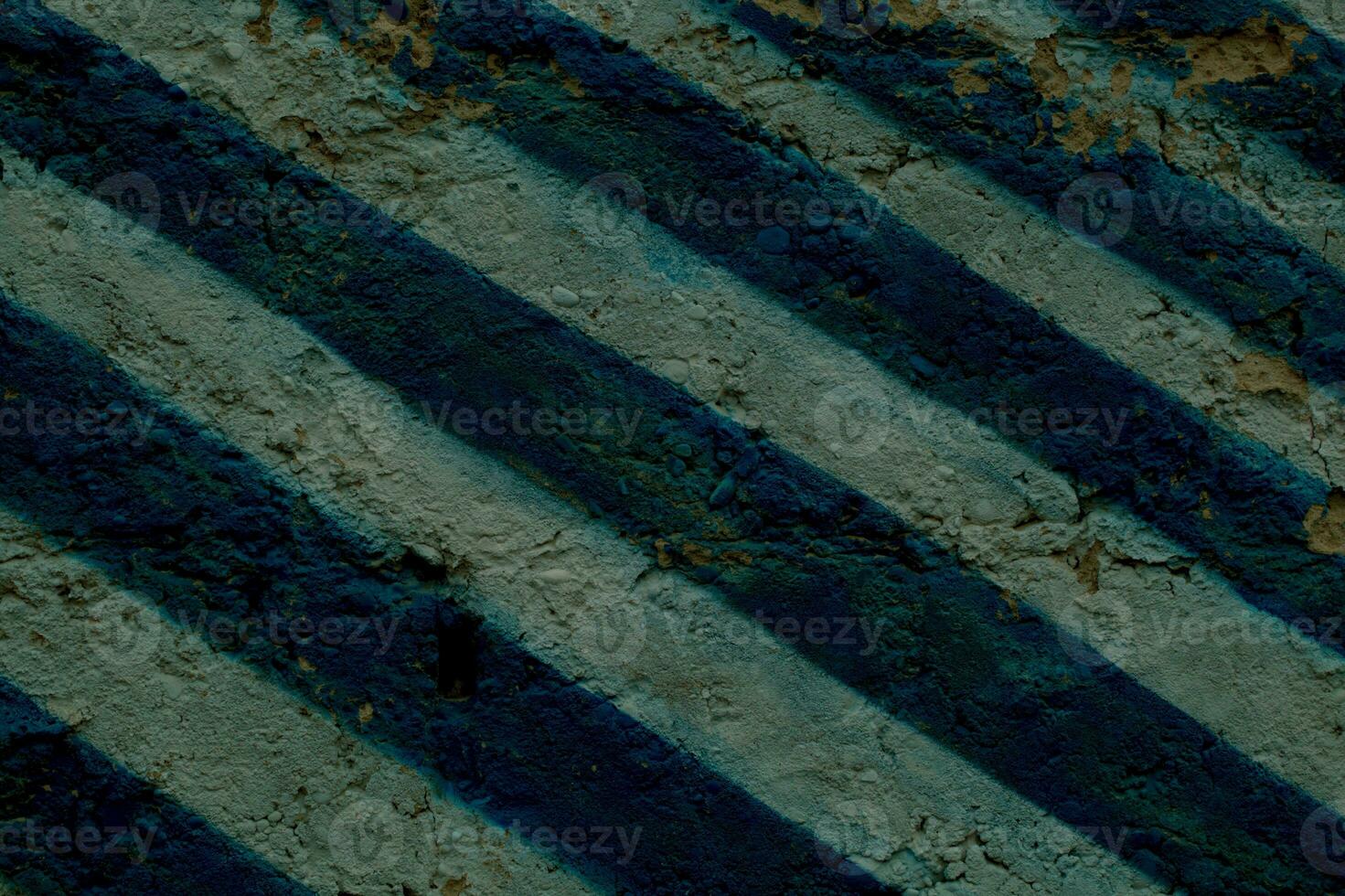 muur geschilderd met blauw en wit chevron strepen foto