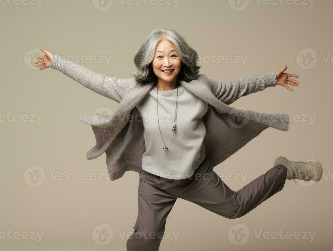 40 jaar oud Aziatisch vrouw in emotioneel dynamisch houding Aan solide achtergrond ai generatief foto
