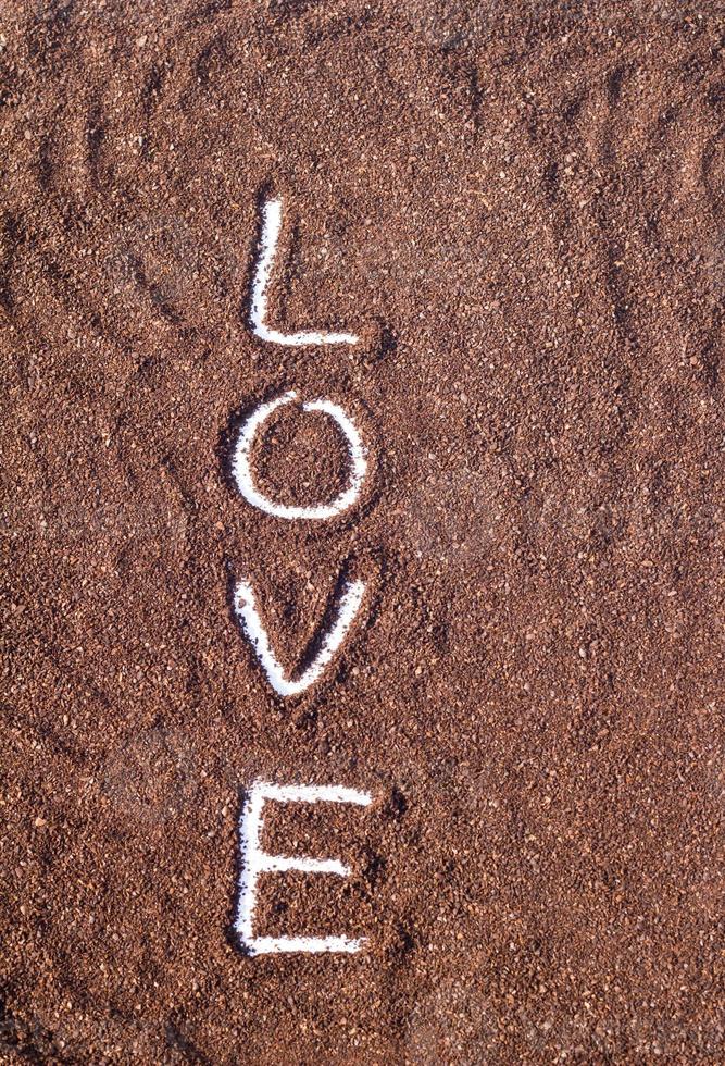 liefdestekst geschreven op cacaopoeder foto