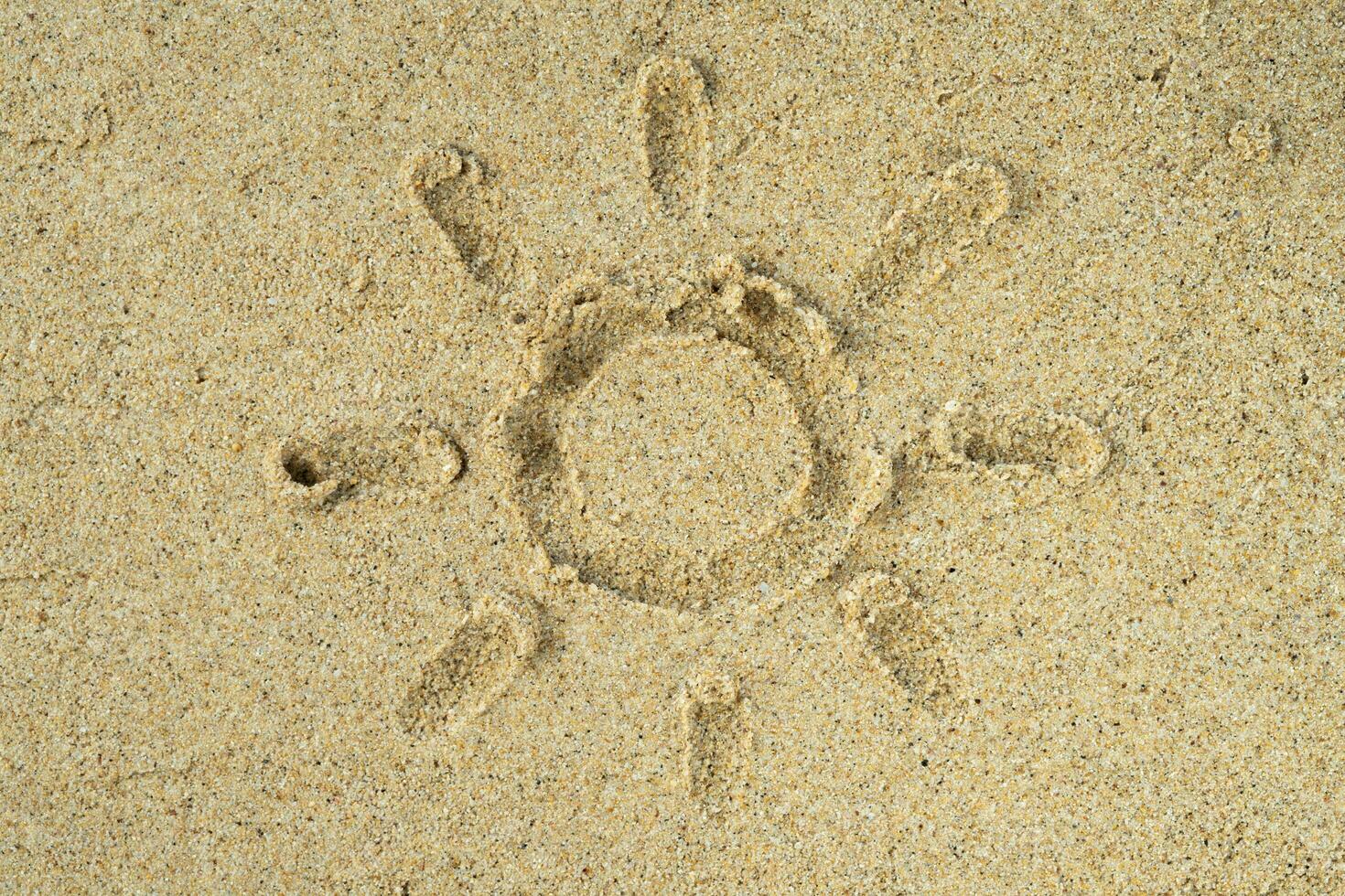 strand zand structuur met zon getrokken foto