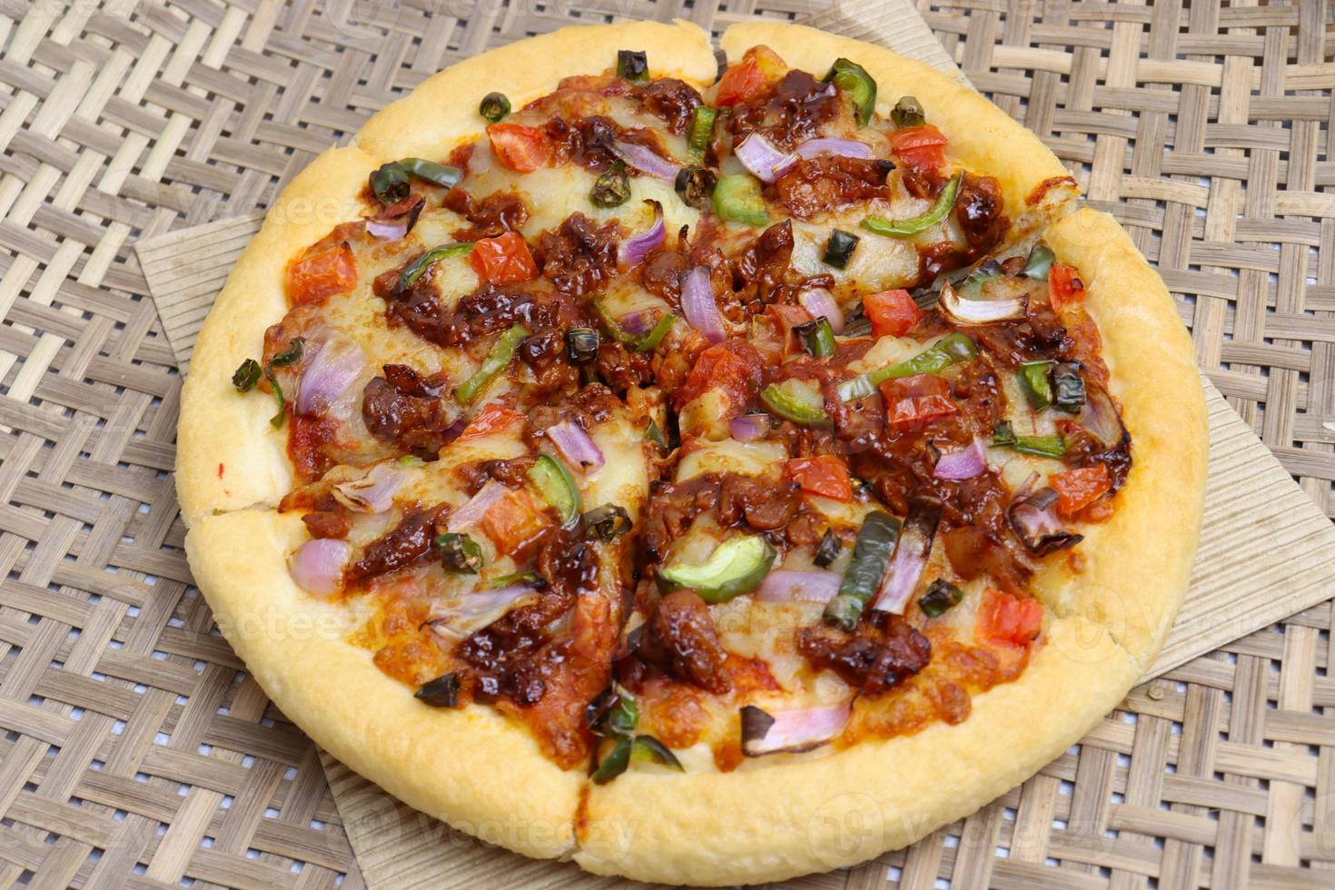 smakelijke pizza close-up voor febr. 09 pizzadag foto