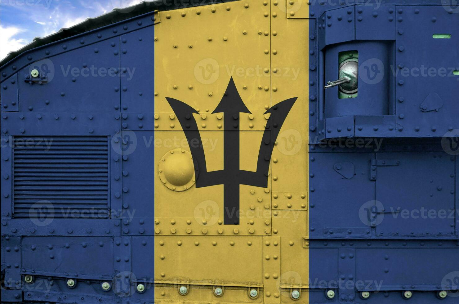 Barbados vlag afgebeeld Aan kant een deel van leger gepantserd tank detailopname. leger krachten conceptuele achtergrond foto