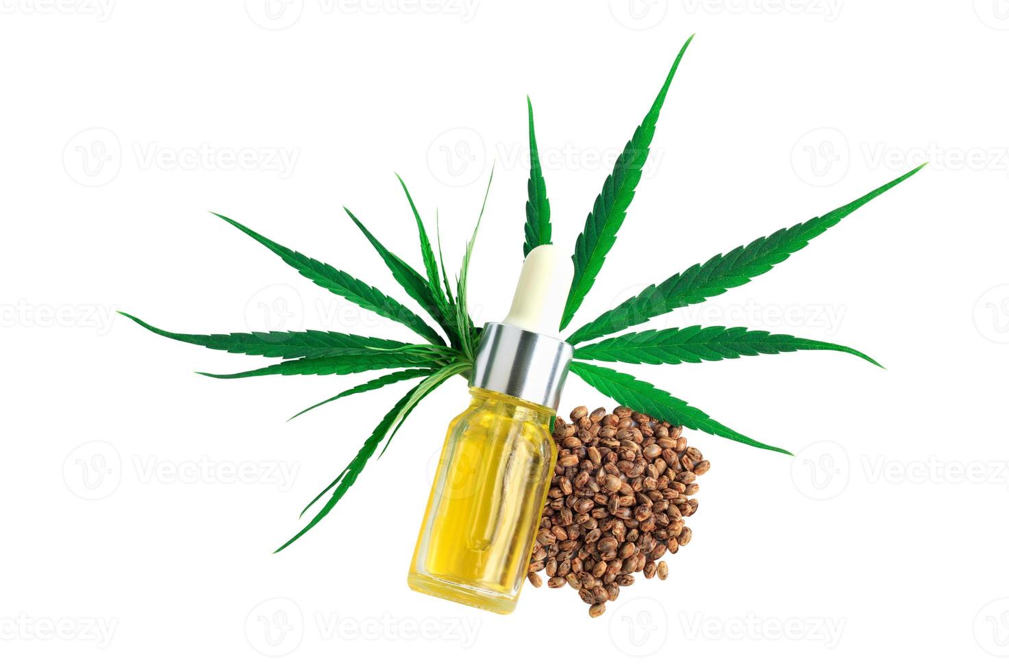 fles met hennepolie, hennepblad en zaden geïsoleerd op een witte achtergrond, CBD-olie hennepproducten, cannabisextractolie, medische marihuana. foto