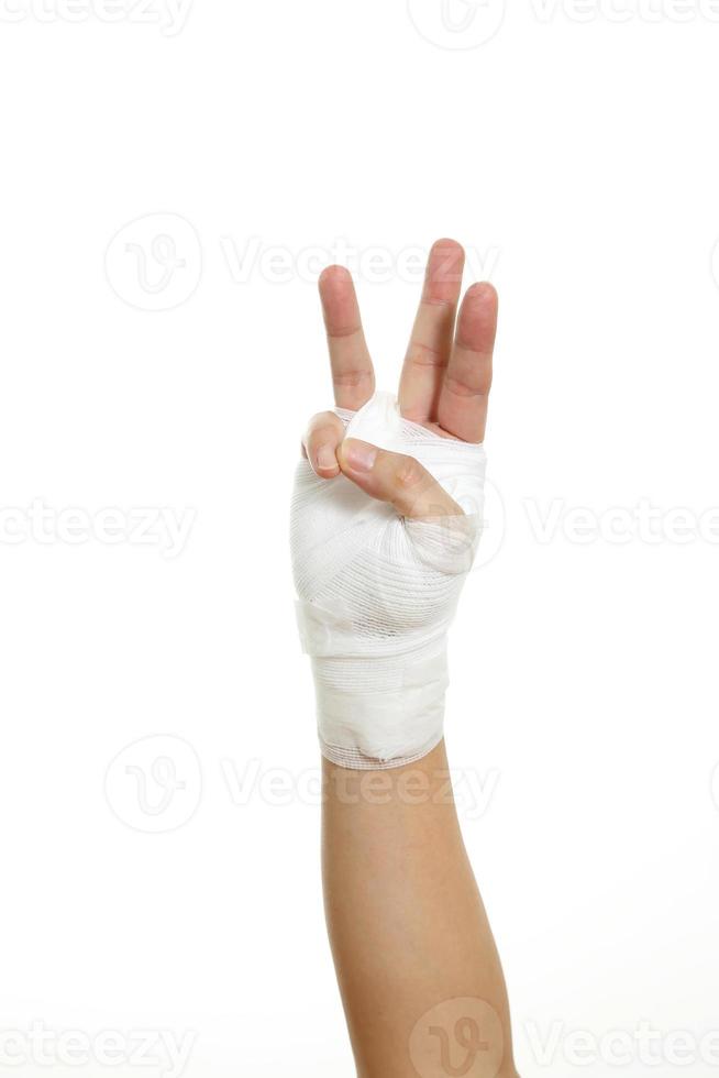 hand met verband foto