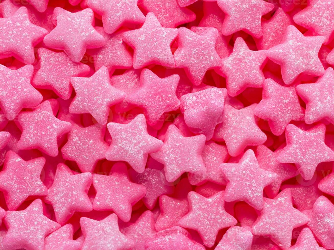 roze sterren snoepjes achtergrond, dichtbij omhoog foto