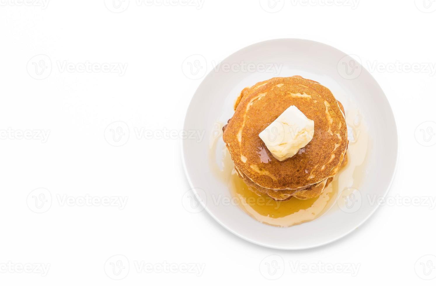 kaas op pannenkoekenstapel met honing foto