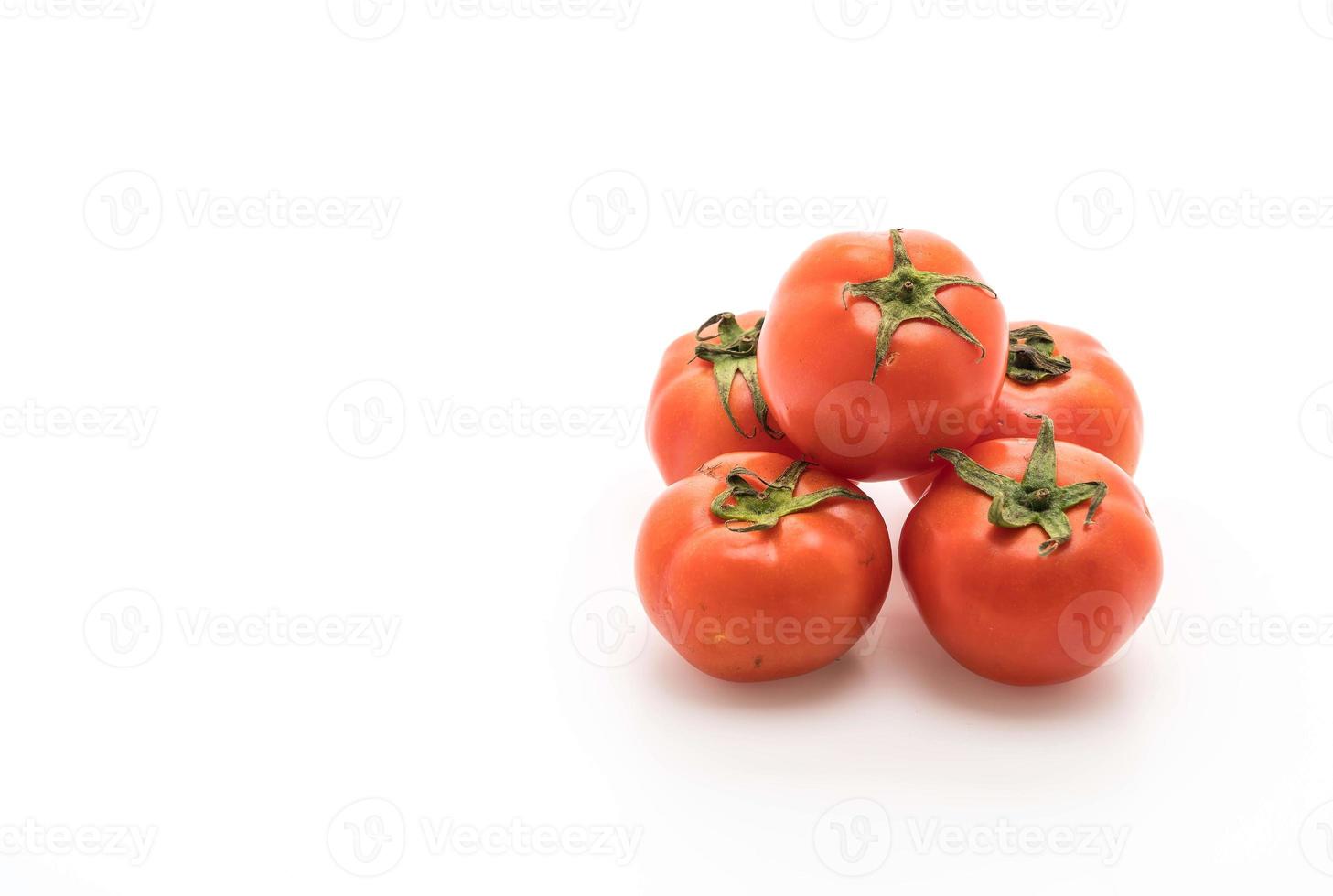 verse tomaten op witte achtergrond foto