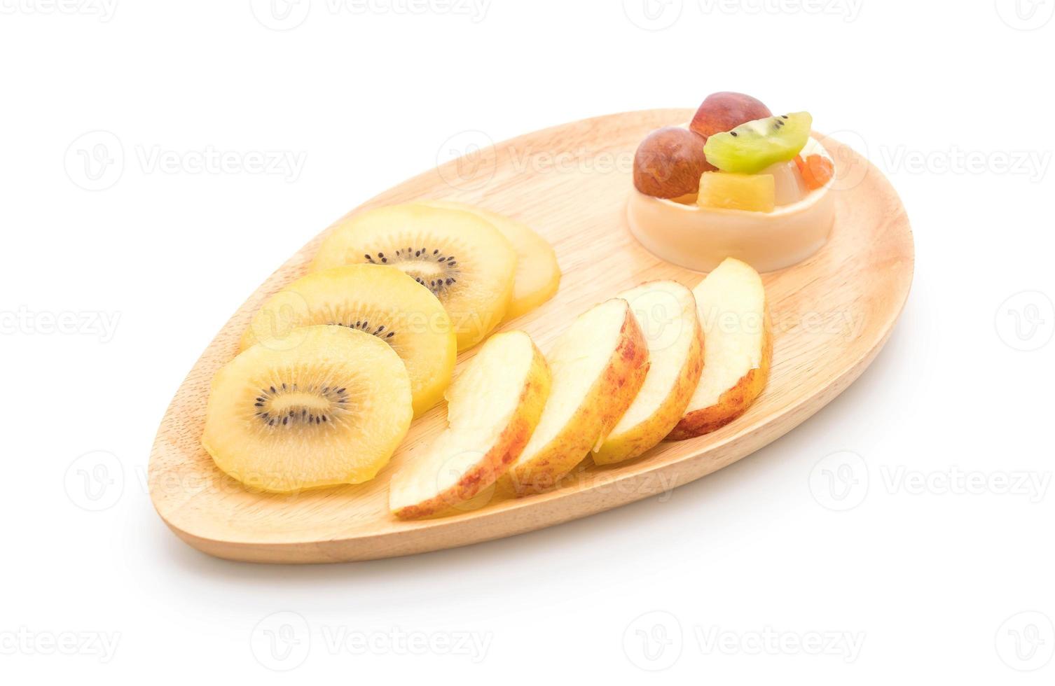 puddingvruchten met kiwi en appel op tafel foto