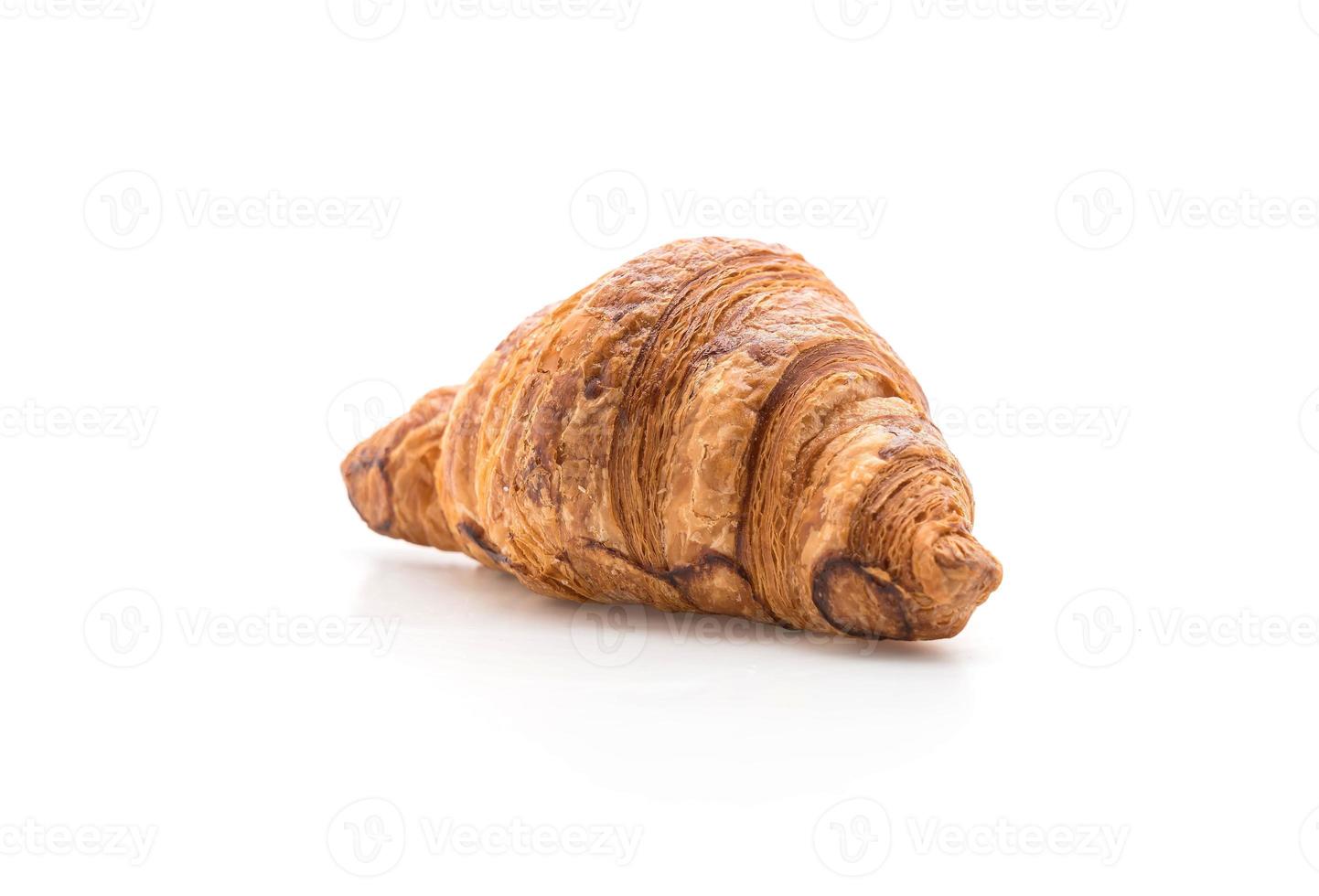 boter croissant op witte achtergrond foto