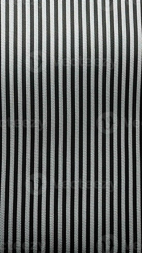 zwart en wit gestreept kleding stof structuur achtergrond. ai gegenereerd foto