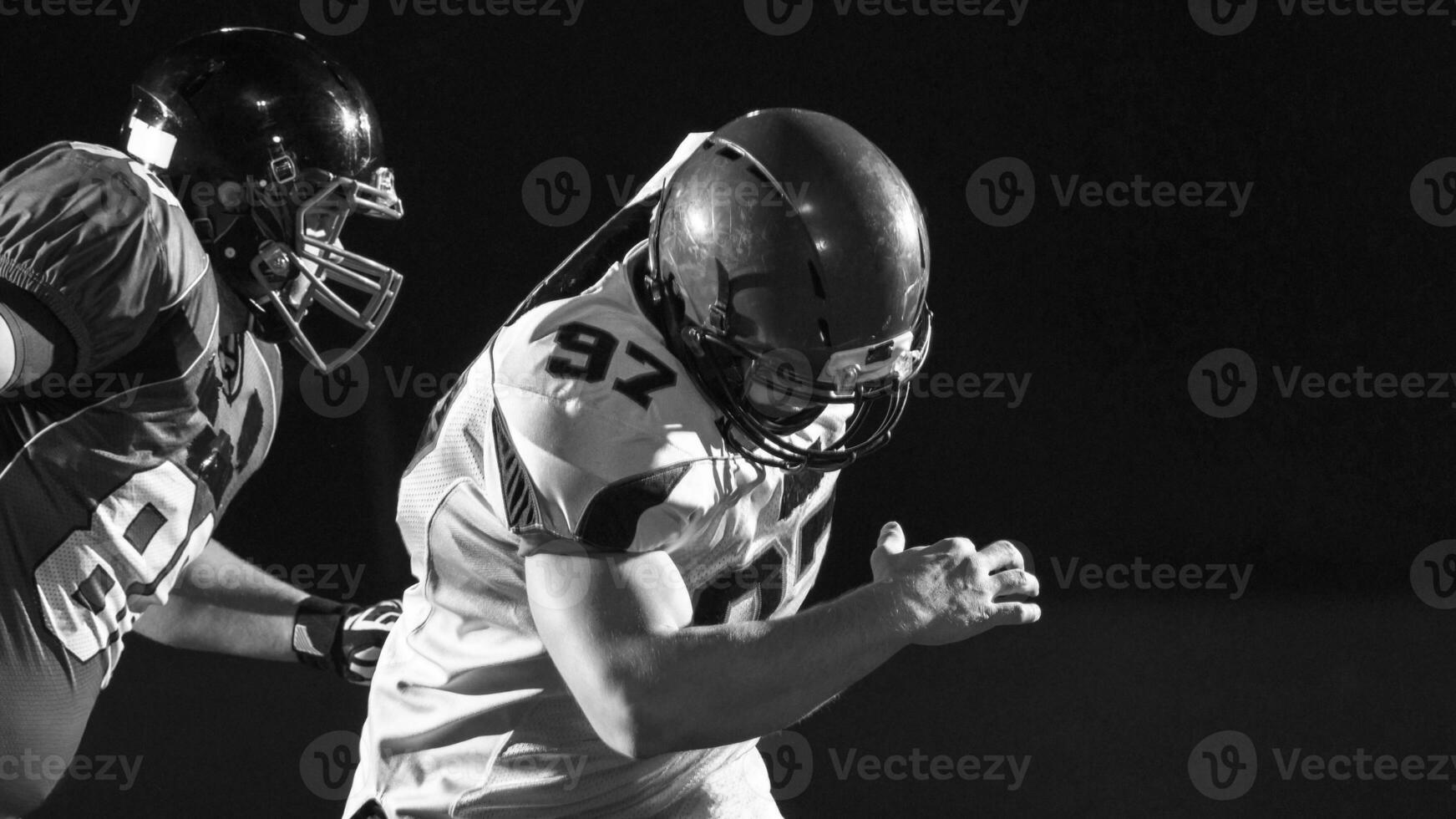 Amerikaans Amerikaans voetbal spelers in actie foto