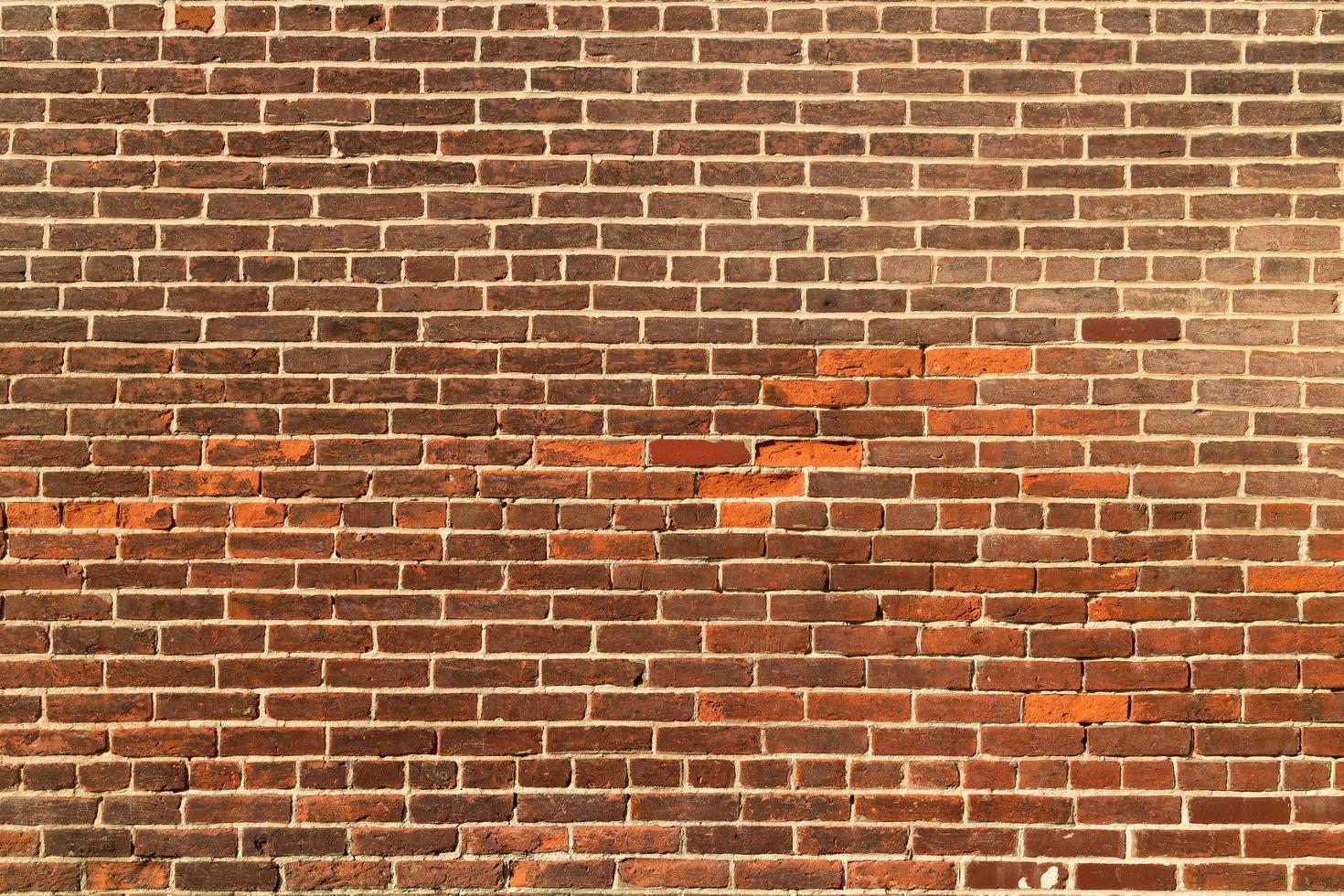 bruine bakstenen muur textuur achtergrond. foto