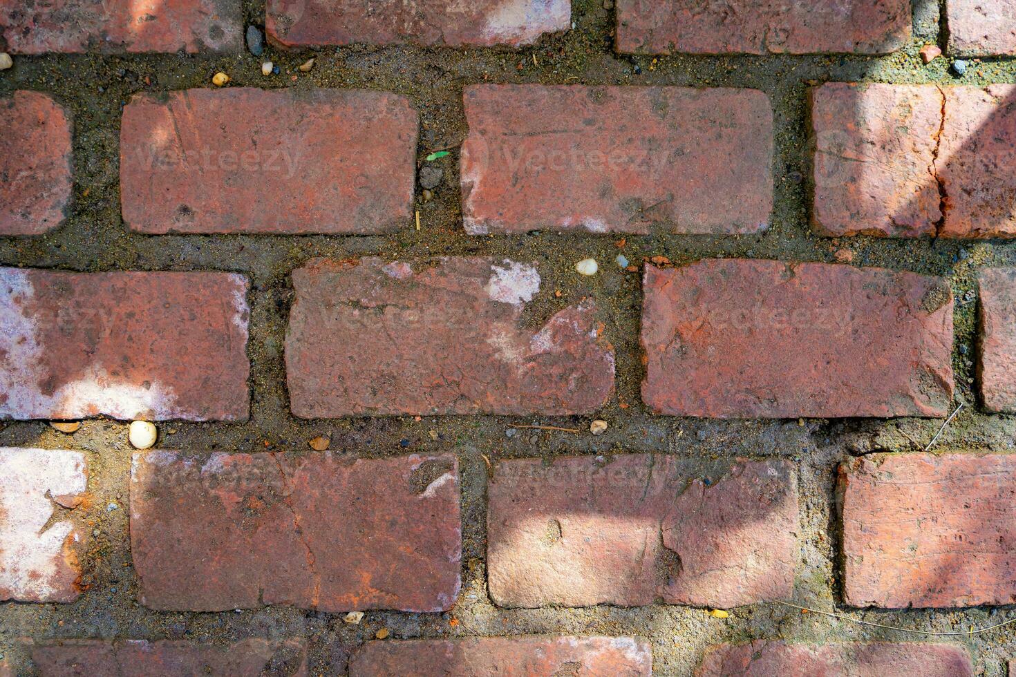 oud steen muur, oud structuur van rood steen blokken detailopname foto