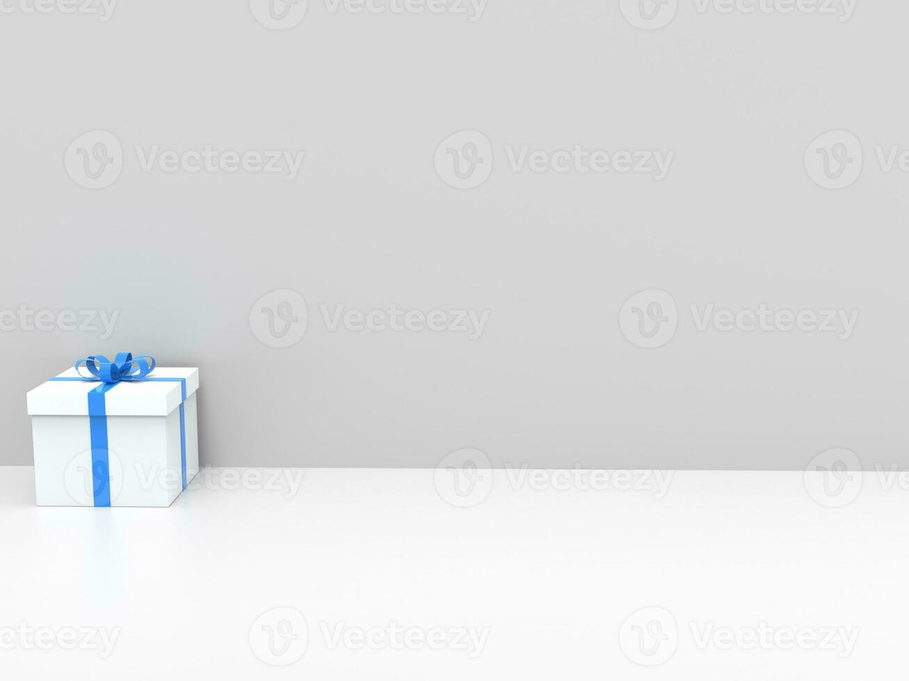 wit geschenk doos met blauw lint - Aan wit achtergrond tegen wit muur foto