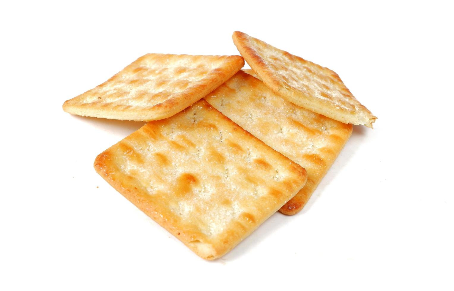 Krokante cracker met suiker geïsoleerd op een witte achtergrond foto