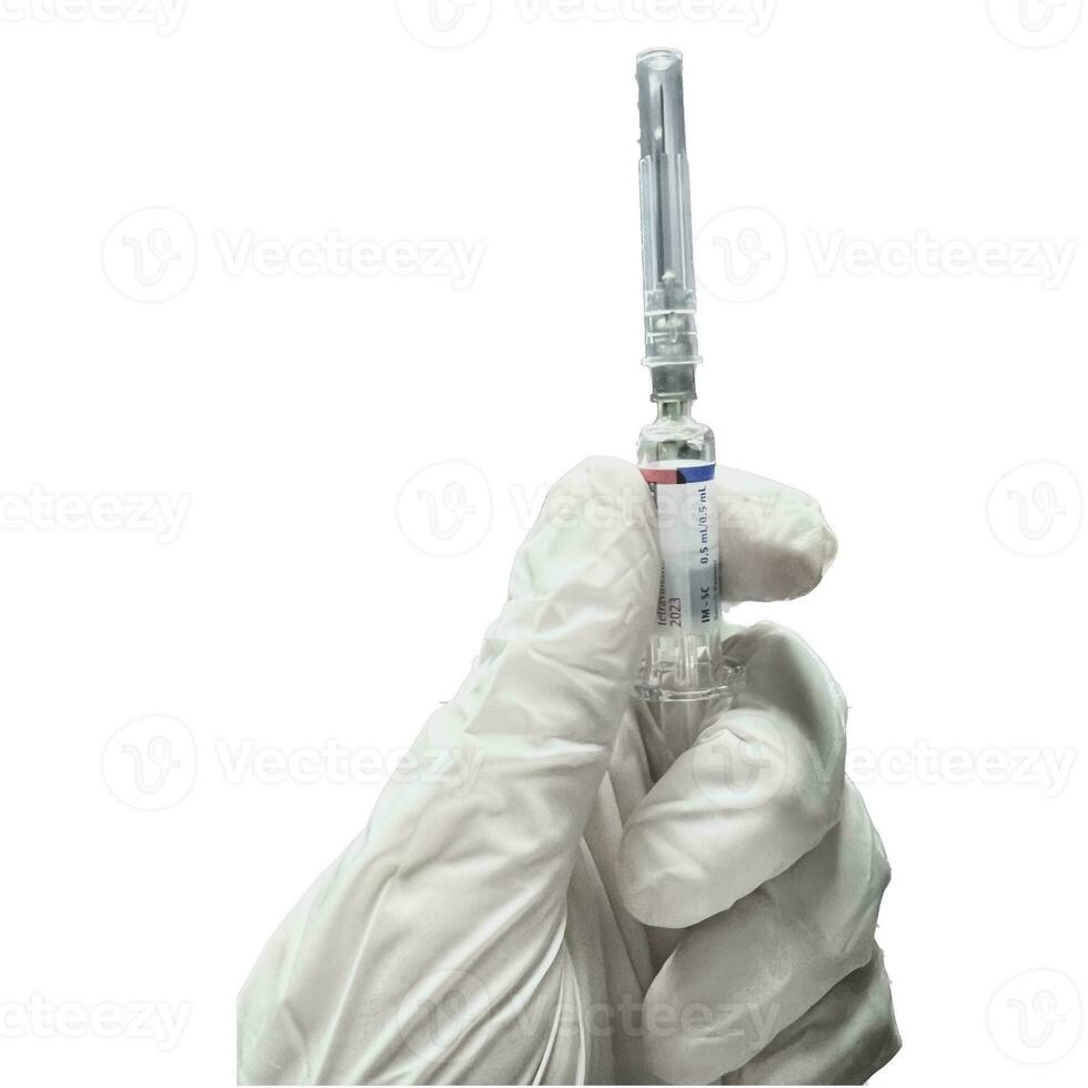 verpleegster hand- slijtage handschoen omgaan met spuiten en naald- voor injectie vaccin foto