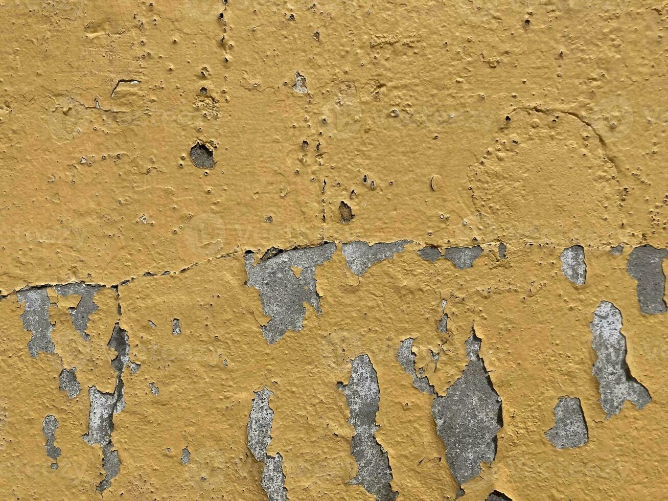 geel oud geschilderd muur foto