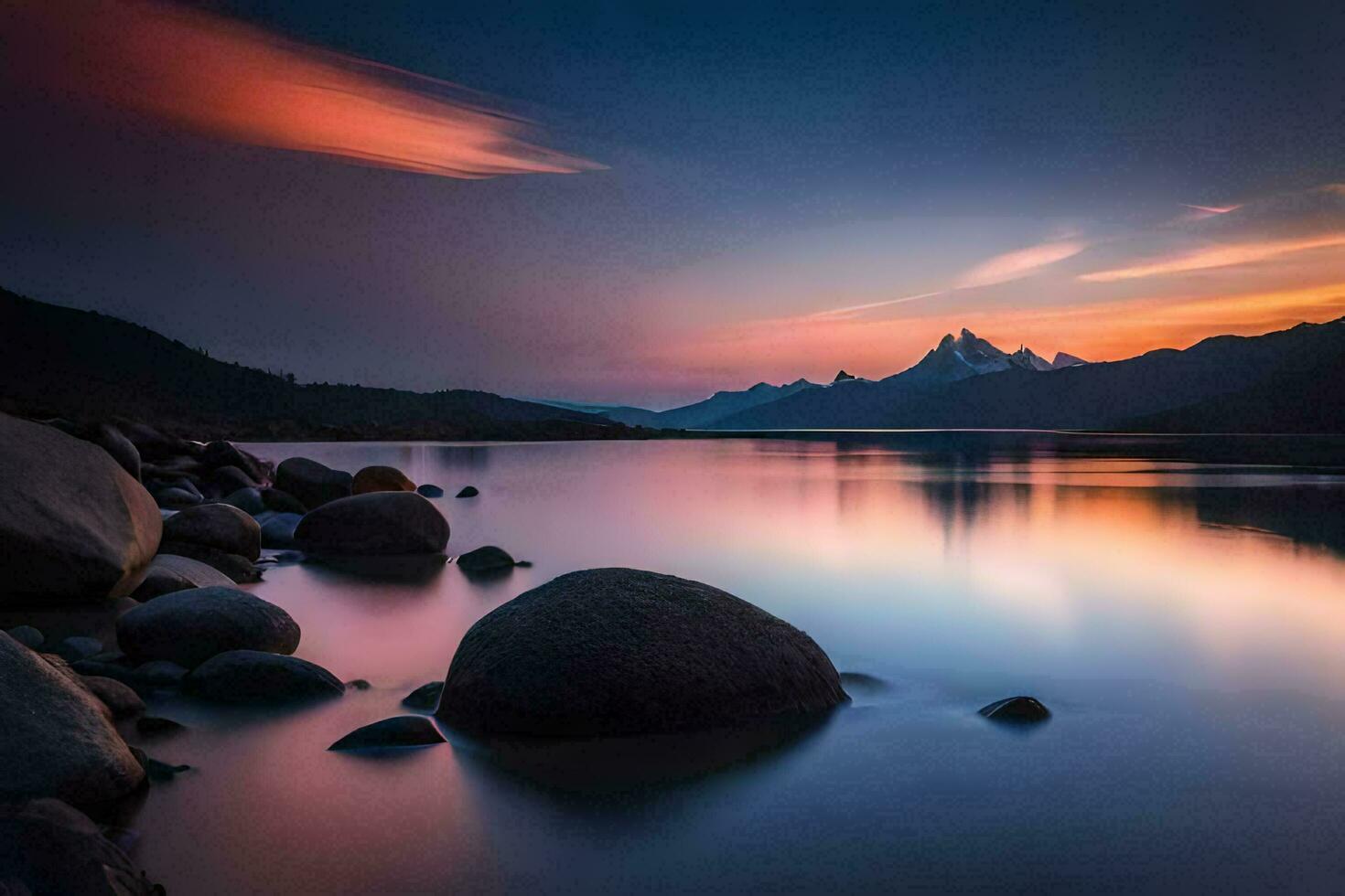 een mooi zonsondergang over- een meer met rotsen en bergen. ai-gegenereerd foto