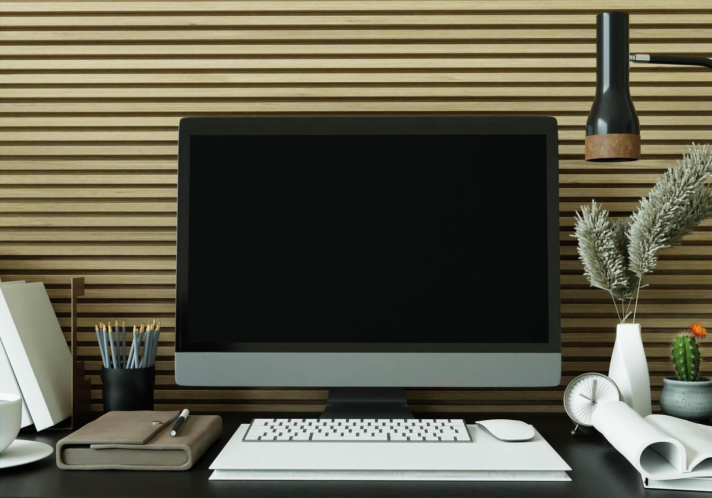 een werkkamer met een computer op de tafel foto