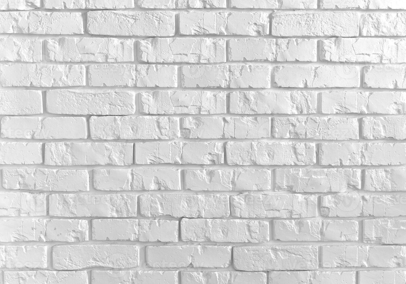 achtergrond van wit steen muur met pellen gips, steen textuur. beton zolder stijl ontwerp ideeën leven huis. plaats voor ontwerp foto