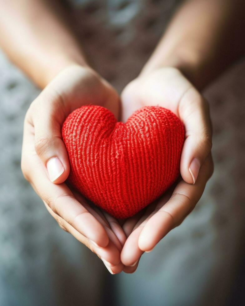 hand- Holding een rood hart. generatief ai foto