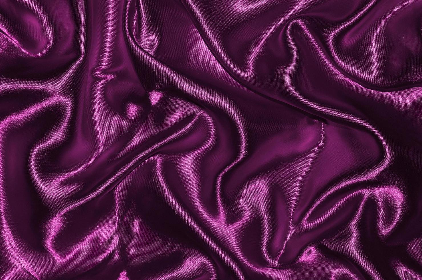 abstracte achtergrond door roze stof, behang door textiel roze. foto