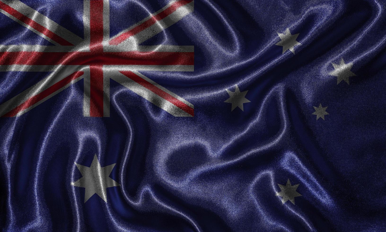 behang door de vlag van australië en wapperende vlag door stof. foto