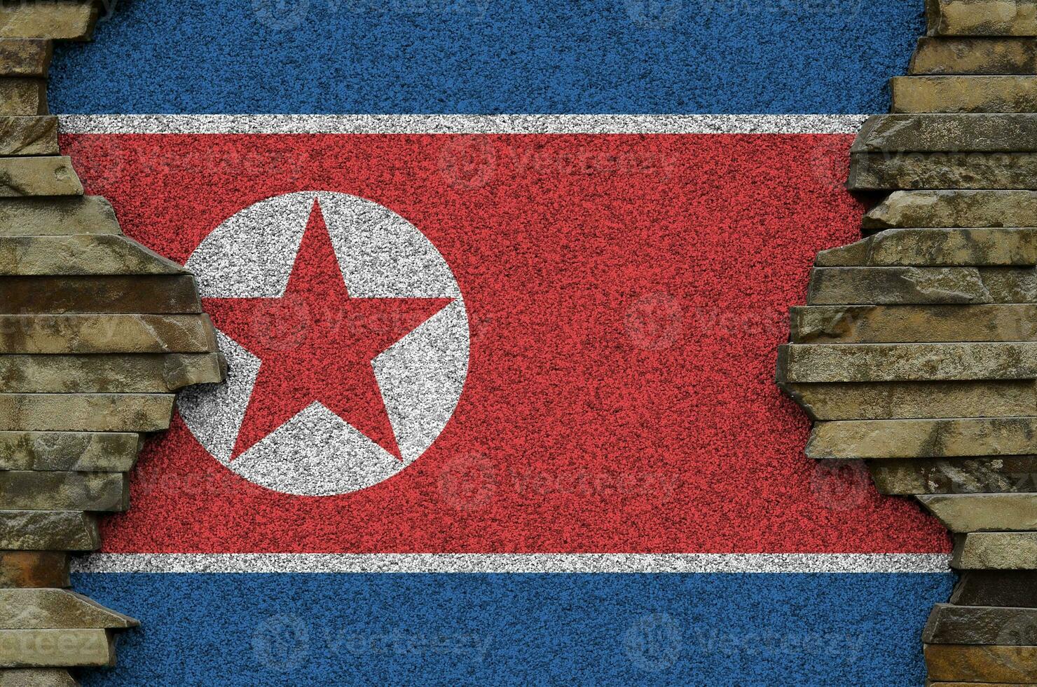 noorden Korea vlag afgebeeld in verf kleuren Aan oud steen muur detailopname. getextureerde banier Aan rots muur achtergrond foto