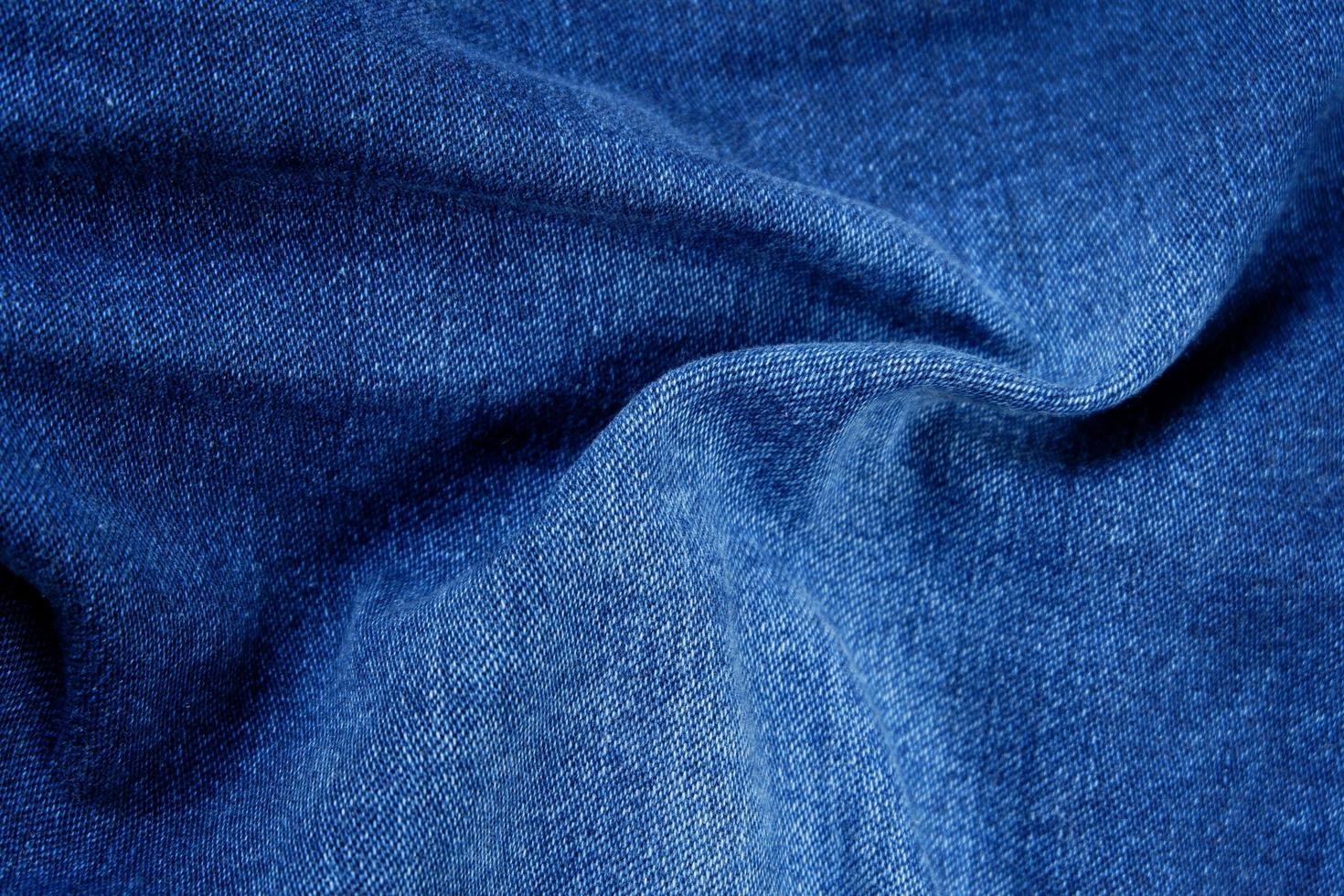 close up van jeans stof textuur achtergrond foto