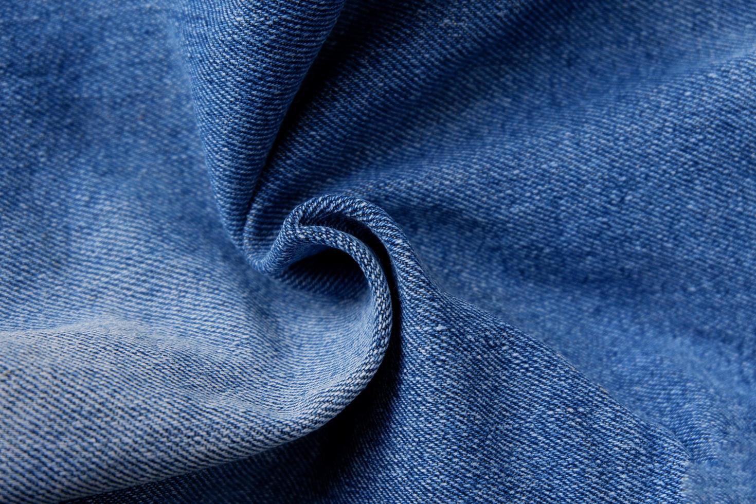 close up van jeans stof textuur achtergrond foto