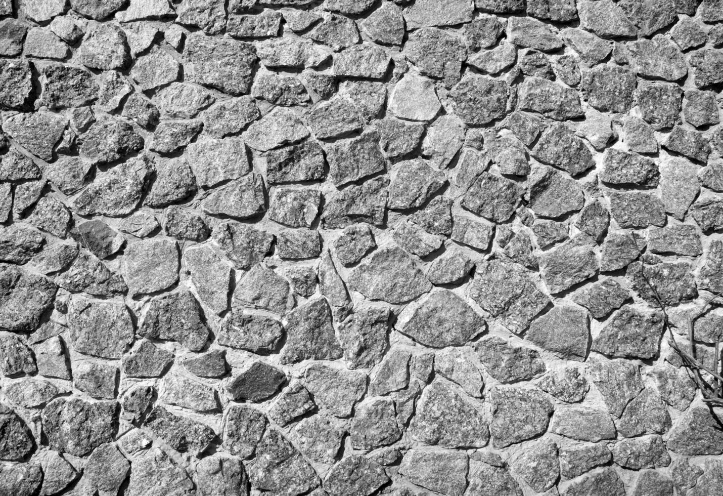 een oud steen muur textuur, zwart en wit steen patroon oppervlakte achtergrond foto