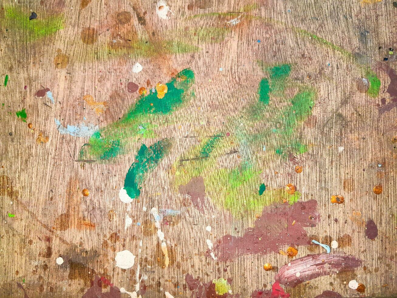 abstract schilderij van een borstel beroertes Aan gebrandschilderd hout structuur foto