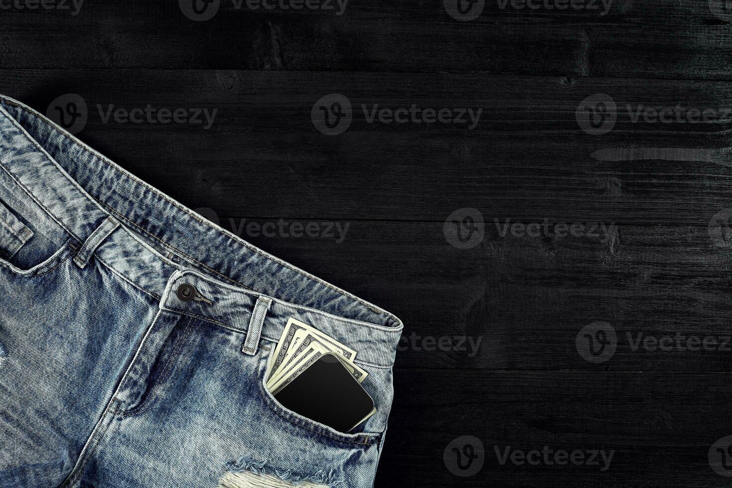 contant geld en slim in uw jeans zak. nog steeds leven. foto