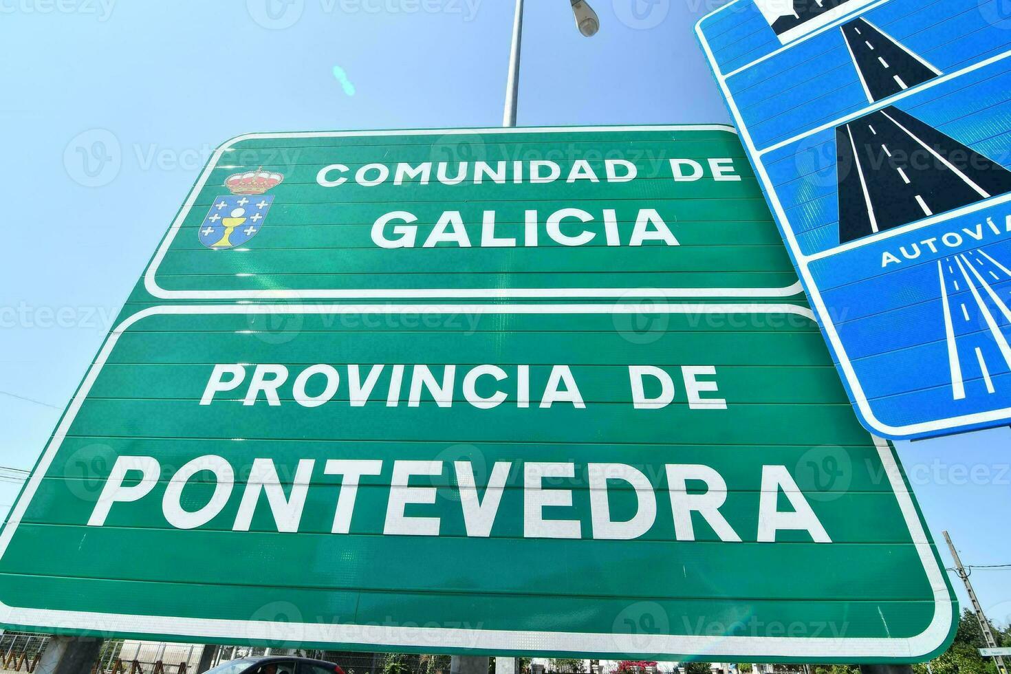 een weg teken dat leest comunidad de Galicië foto