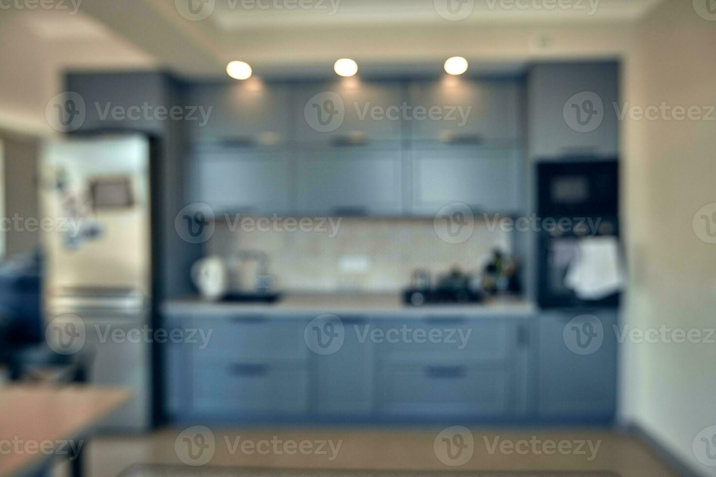 wazig beeld van modern keuken interieur voor achtergrond foto