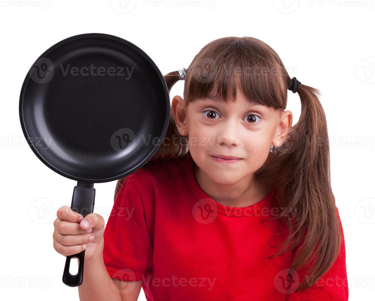 klein meisje met een koekenpan foto