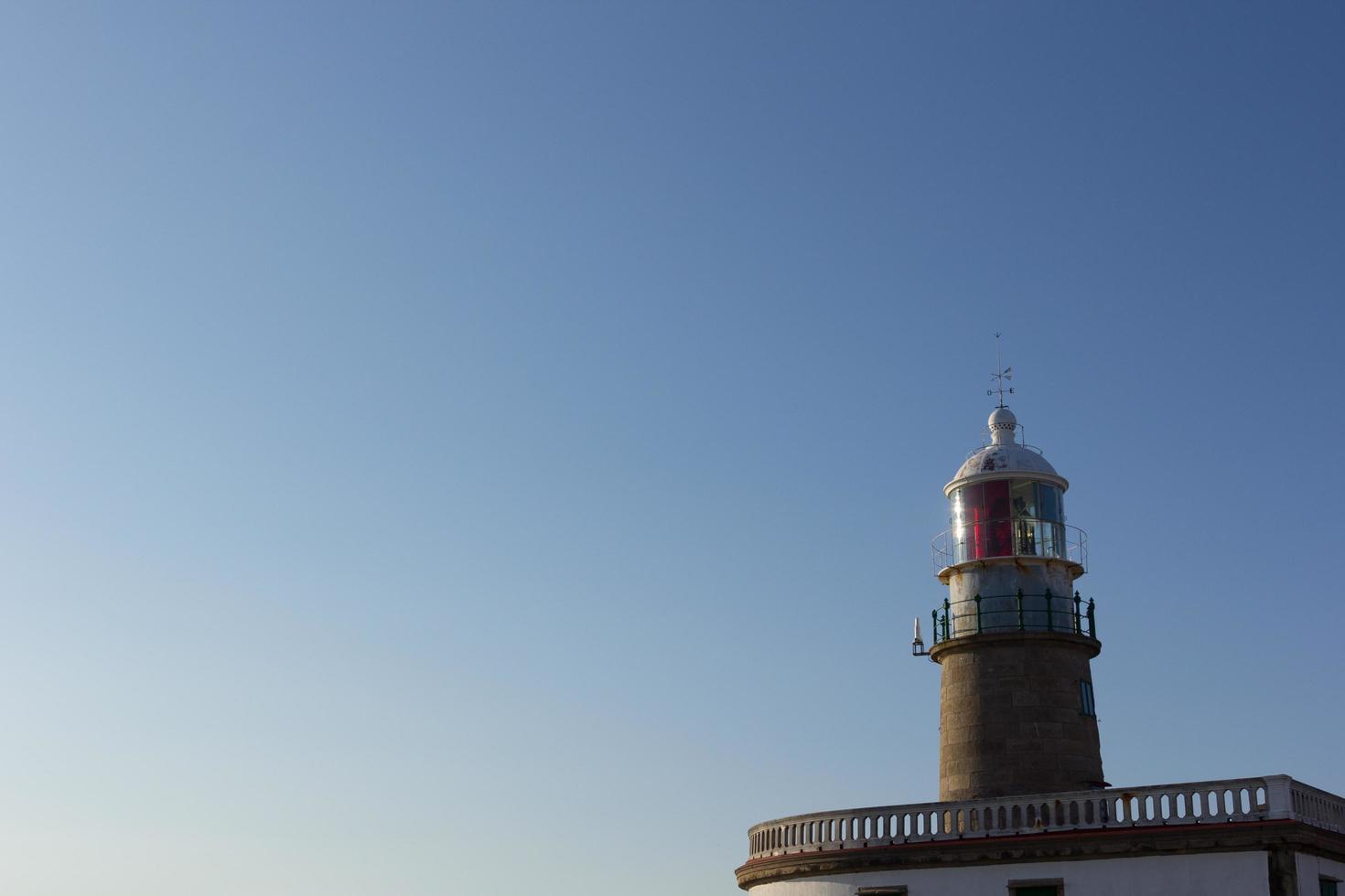 Corrubedo vuurtoren in de Atlantische Oceaan, Galicië, Spanje foto