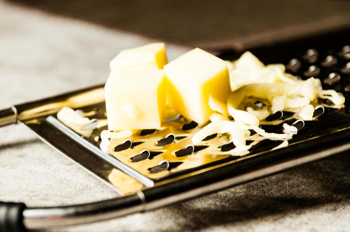 geraspte Parmezaanse kaas, kaasrasp met cheddar foto