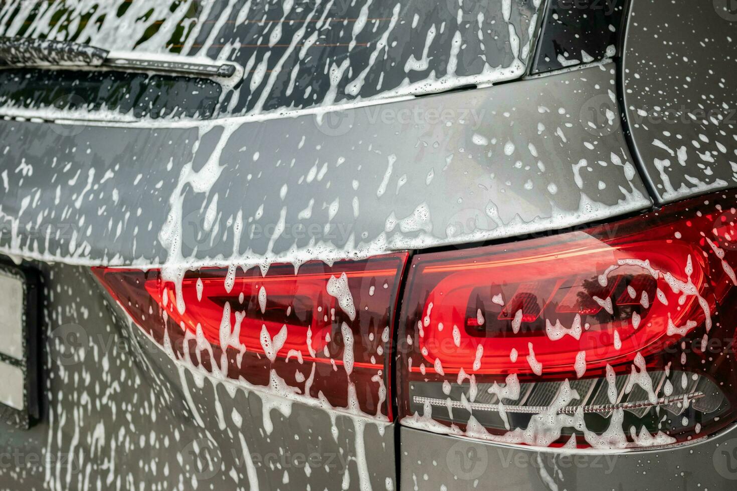 auto schoonmaak en het wassen met schuim zeep foto