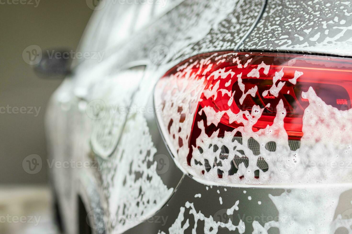 auto schoonmaak en het wassen met schuim zeep foto