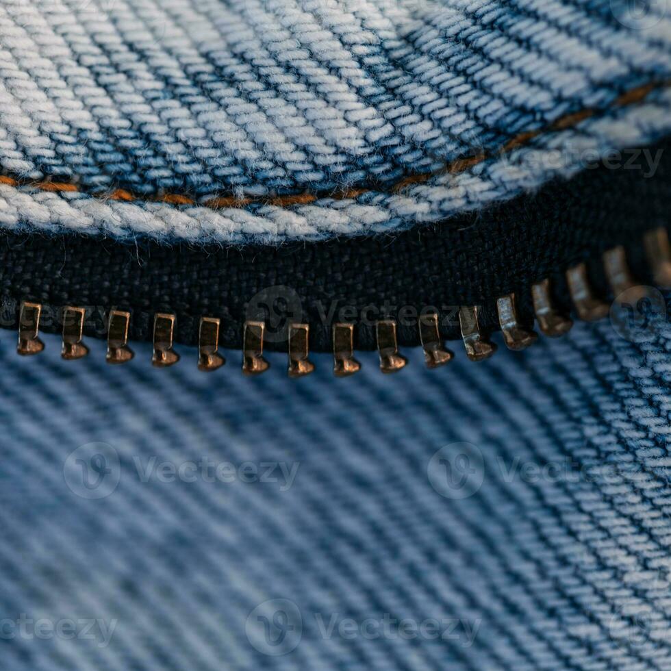 blauw mode jeans en metaal rits, macro. denim structuur foto