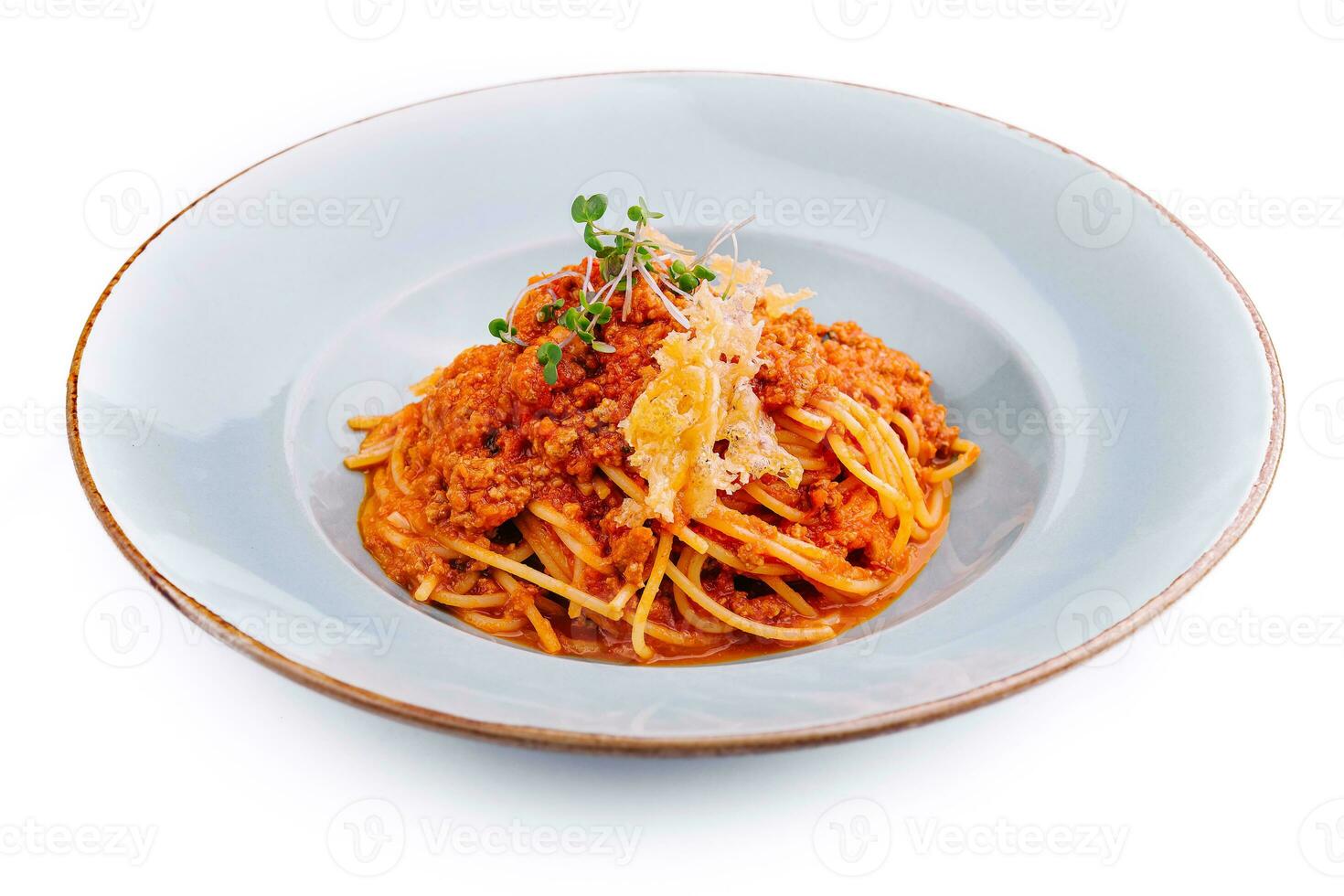 spaghetti bolognese met Parmezaanse kaas kaas en tomaten foto